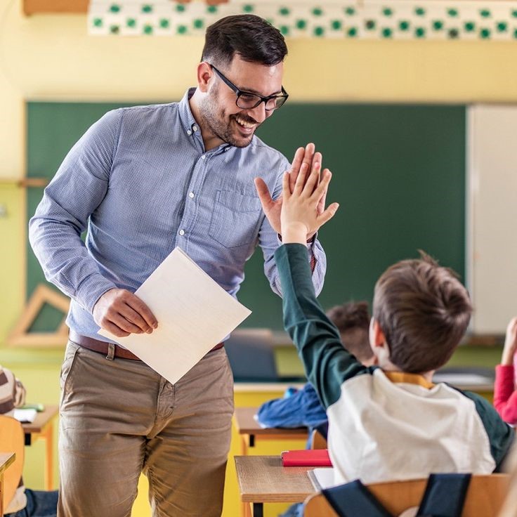teacher solving student's doubt in classroom-faq ban on homepage