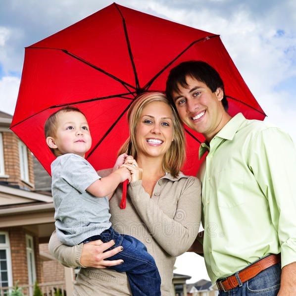 happy family holding umbrella-banner for term life insurance